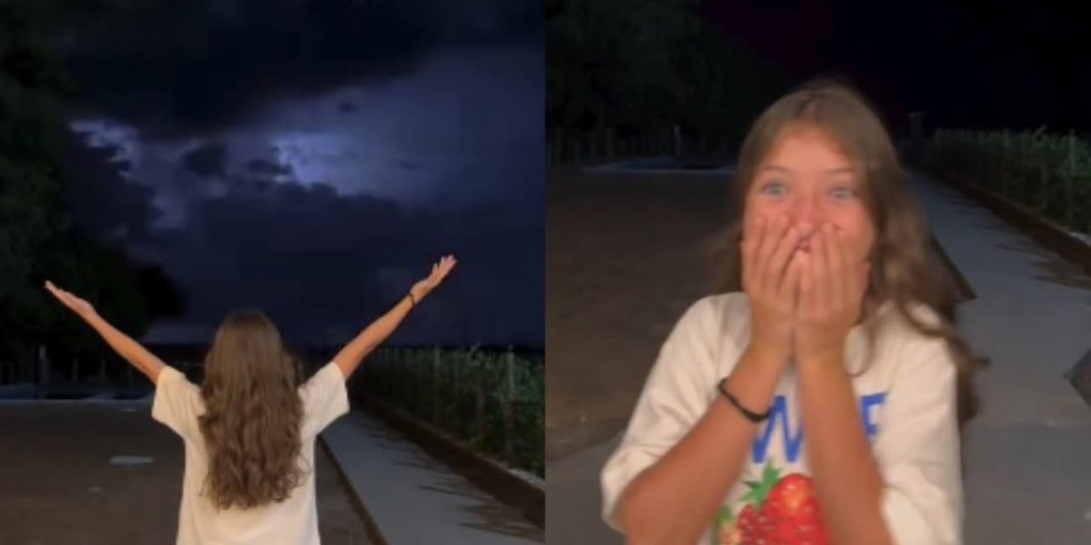 Menina ora e raios iluminam o céu durante tempestade