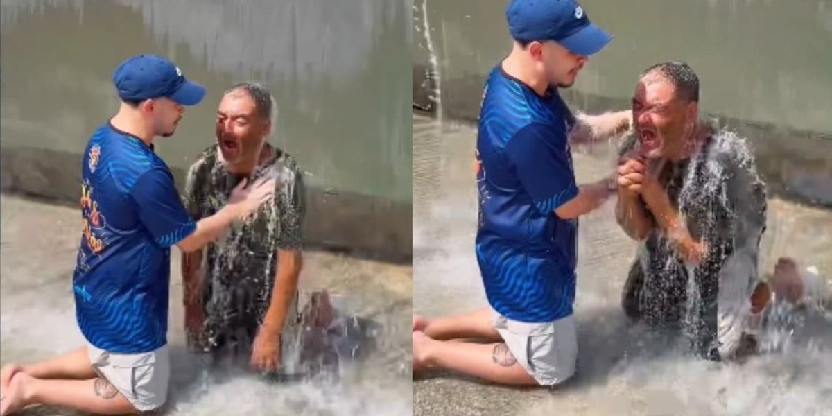 Homem se batiza em chafariz durante evangelização no Carnaval